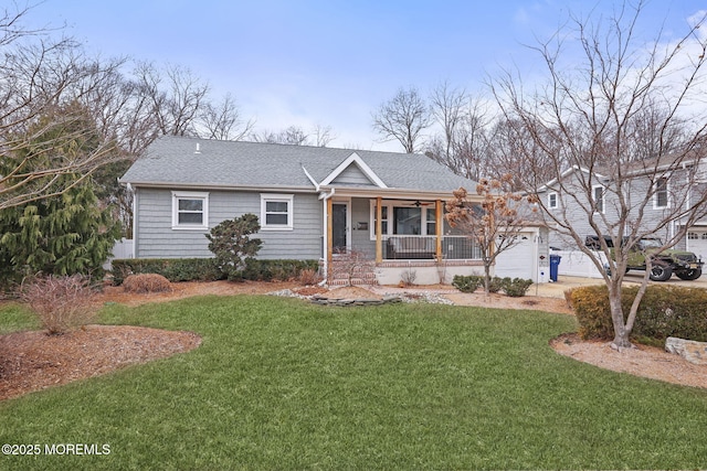 view of front facade featuring a porch, a front yard, roof with shingles, and a garage