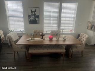 dining room with dark wood-type flooring