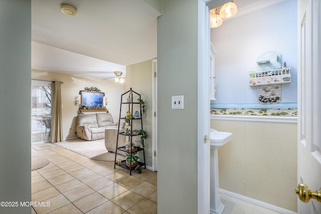 bathroom with tile patterned floors and ceiling fan