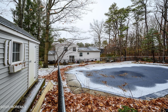 view of yard layered in snow