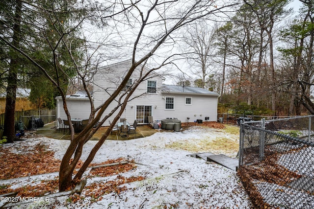 view of snow covered property