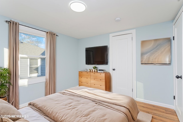 bedroom featuring light hardwood / wood-style floors