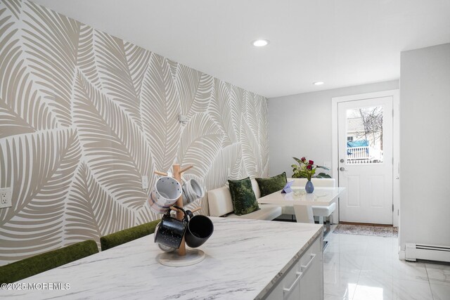 67 Grand Ave, Toms River, NJ 08753 - kitchen with a baseboard radiator, recessed lighting, an accent wall, white cabinetry, and wallpapered walls