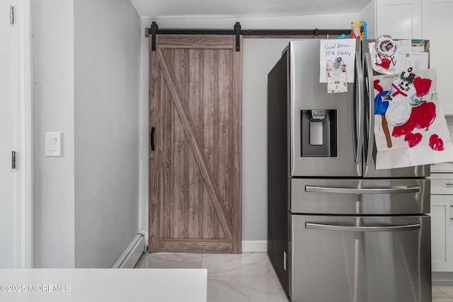 67 Grand Ave, Toms River, NJ 08753 - kitchen featuring marble finish floor, a barn door, a baseboard heating unit, white cabinets, and stainless steel fridge
