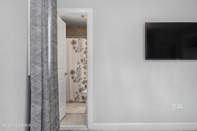 67 Grand Ave, Toms River, NJ 08753 - full bath with curtained shower, toilet, and baseboards