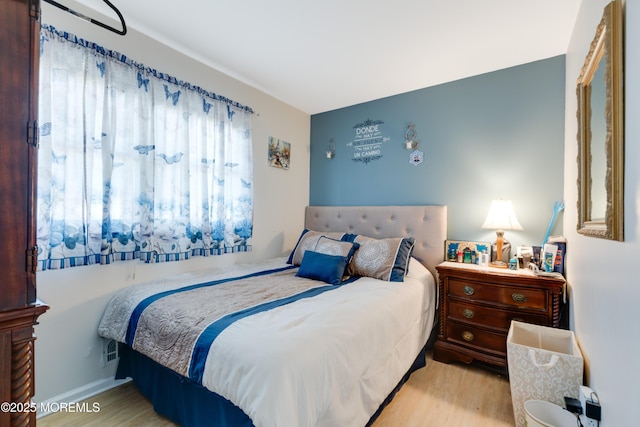 bedroom featuring light hardwood / wood-style flooring