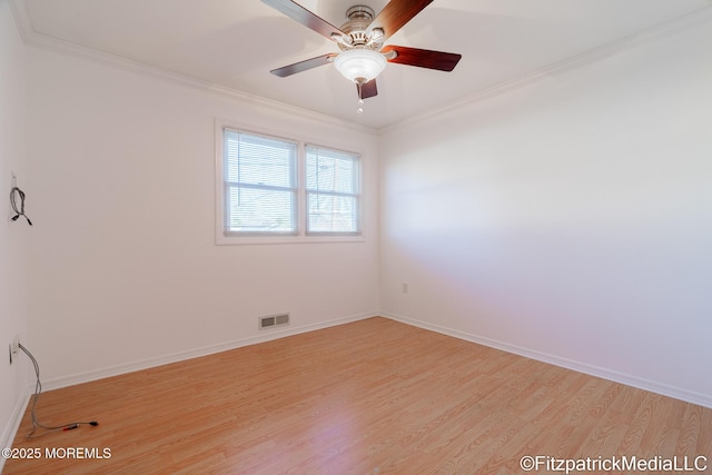 empty room featuring light hardwood / wood-style floors, ceiling fan, and ornamental molding