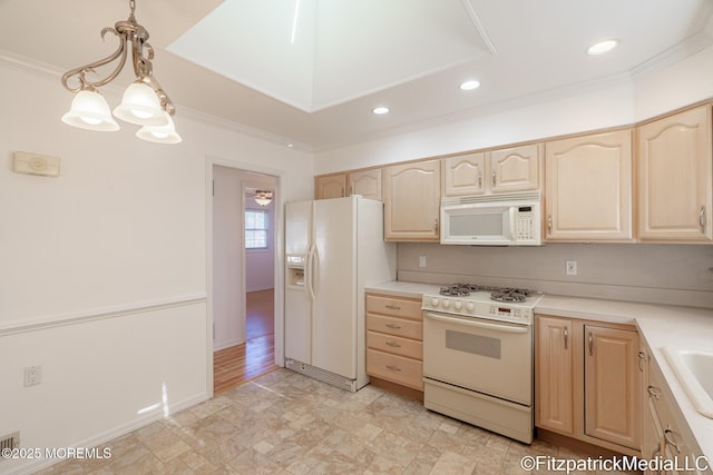 kitchen featuring decorative light fixtures, an inviting chandelier, white appliances, crown molding, and light brown cabinetry