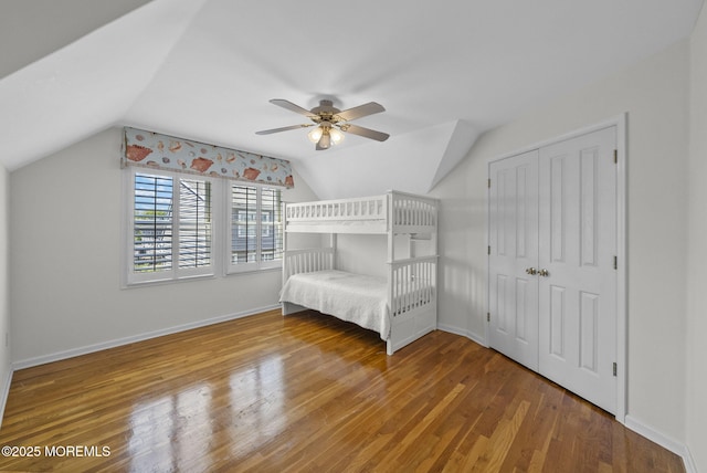 200 2nd Ave Unit 14, Belmar, NJ 07719 - unfurnished bedroom with vaulted ceiling, wood finished floors, a closet, baseboards, and ceiling fan