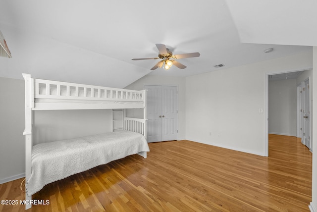 200 2nd Ave Unit 14, Belmar, NJ 07719 - bedroom with wood finished floors, baseboards, ceiling fan, and lofted ceiling