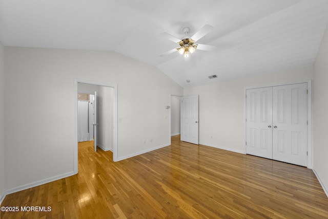 200 2nd Ave Unit 14, Belmar, NJ 07719 - unfurnished bedroom featuring vaulted ceiling, light wood-type flooring, a closet, baseboards, and ceiling fan