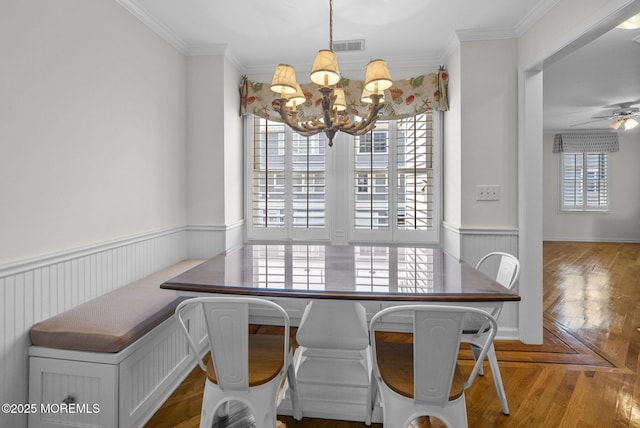 200 2nd Ave Unit 14, Belmar, NJ 07719 - dining area with ornamental molding, a chandelier, wood finished floors, and a ceiling fan