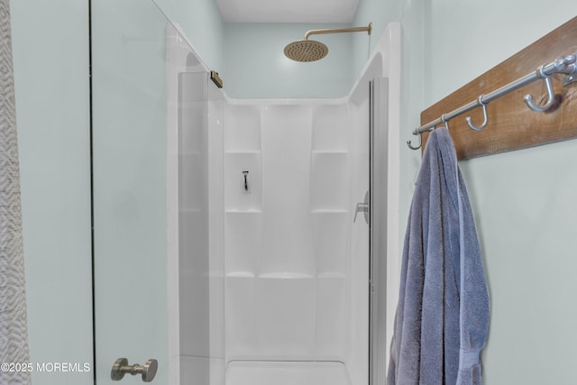 bathroom with a stall shower