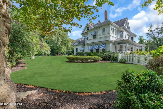 view of yard with fence