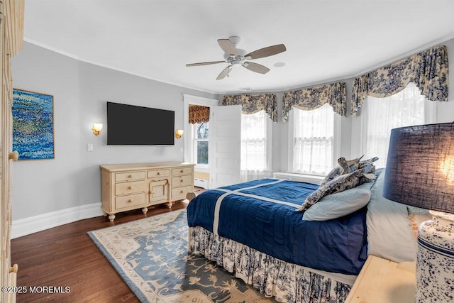 bedroom featuring dark wood-style floors, ceiling fan, and baseboards