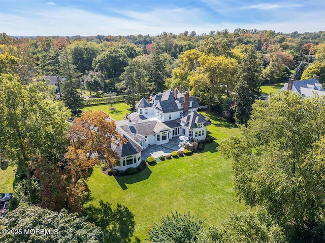 bird's eye view with a forest view