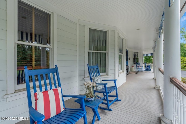 wooden terrace with covered porch