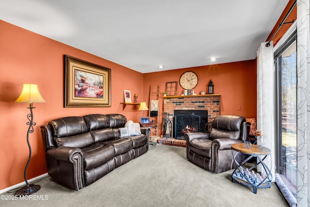 carpeted living room with a fireplace