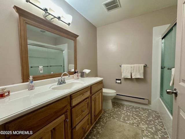 bathroom with enclosed tub / shower combo, toilet, visible vents, vanity, and baseboard heating