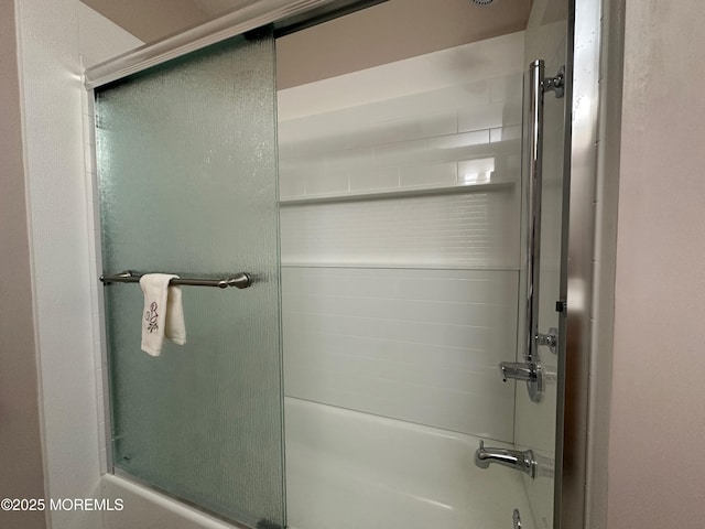 full bath with shower / bath combination with glass door