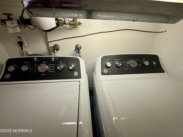 laundry room featuring washer and clothes dryer