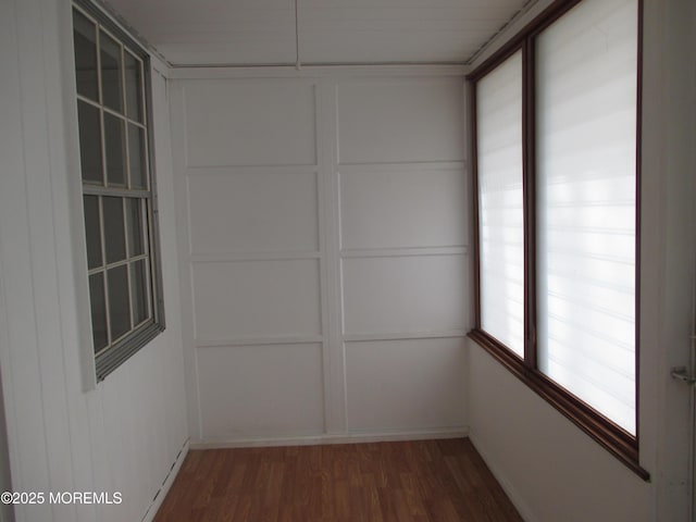 spare room featuring dark hardwood / wood-style flooring