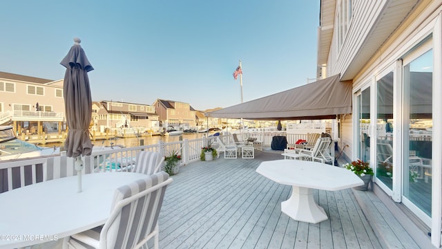 deck featuring a water view