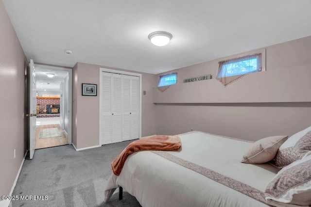 carpeted bedroom featuring a closet