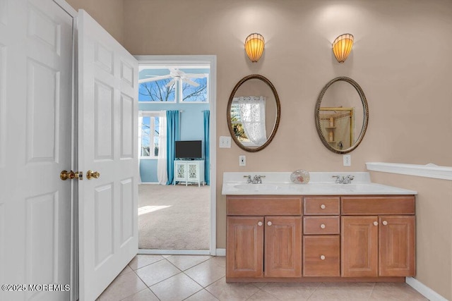 bathroom featuring tile patterned floors and vanity