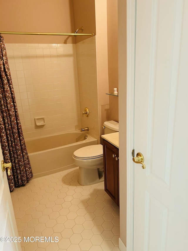 full bath with shower / tub combo, vanity, toilet, and tile patterned floors