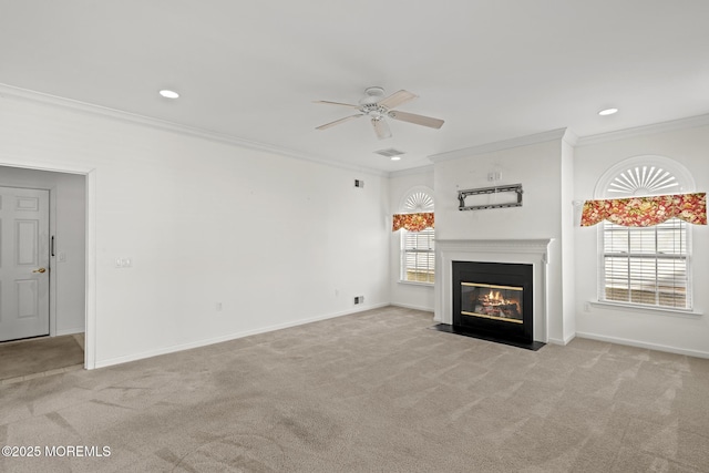 unfurnished living room with a fireplace with flush hearth, light carpet, ornamental molding, and baseboards