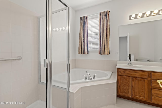 full bathroom with toilet, a stall shower, vanity, and a bath