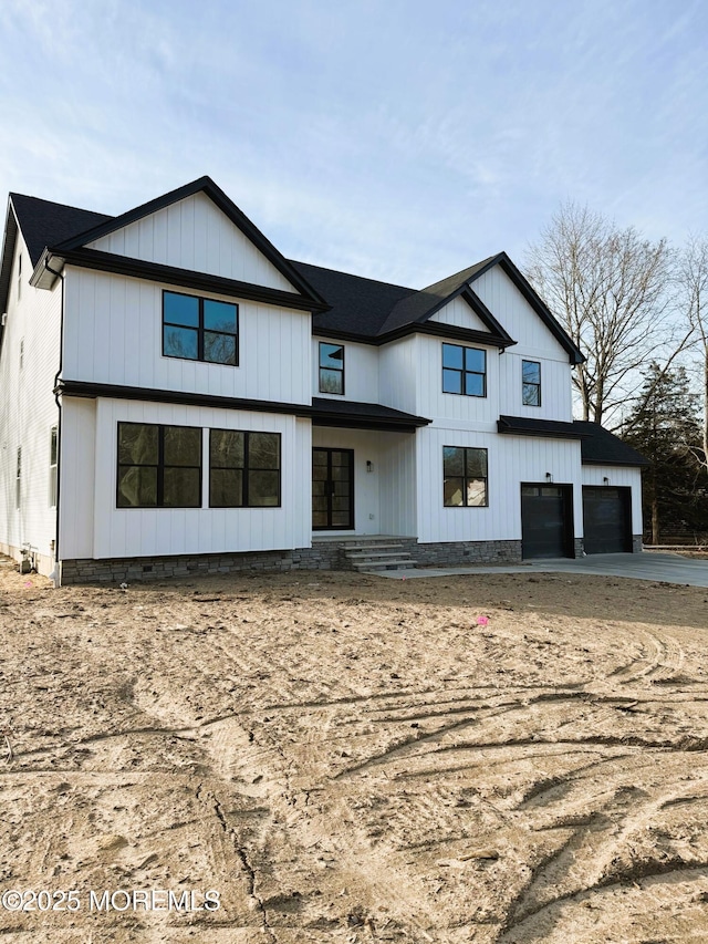 modern farmhouse style home with a garage