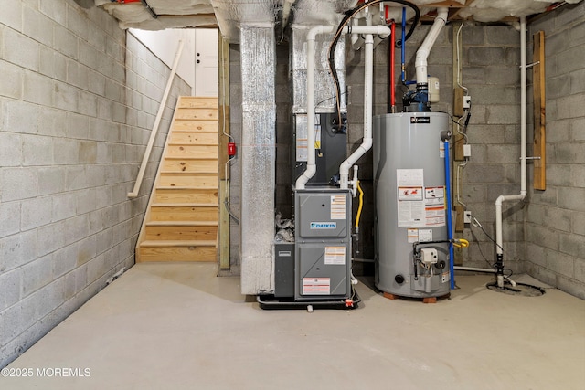 utility room with heating unit and gas water heater