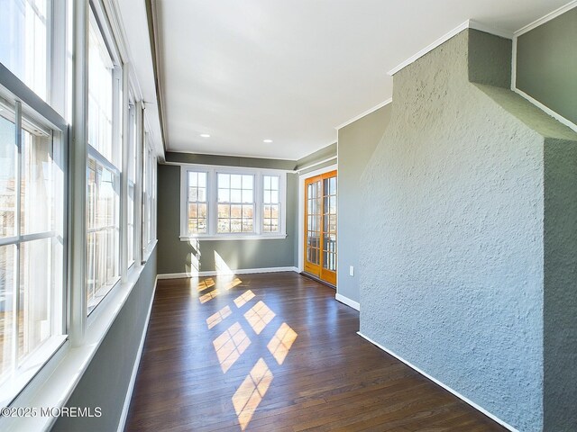 78 Lake Ave, Ocean Grove, NJ 07756 - unfurnished room featuring ornamental molding, dark wood-style flooring, a textured wall, and baseboards