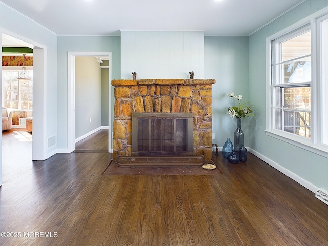 78 Lake Ave, Ocean Grove, NJ 07756 - unfurnished living room featuring baseboards, a stone fireplace, wood finished floors, and crown molding