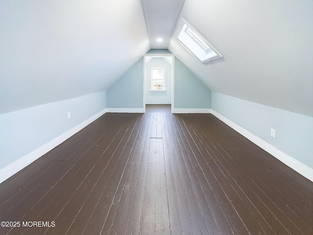 78 Lake Ave, Ocean Grove, NJ 07756 - additional living space with vaulted ceiling with skylight, dark wood-style flooring, and baseboards