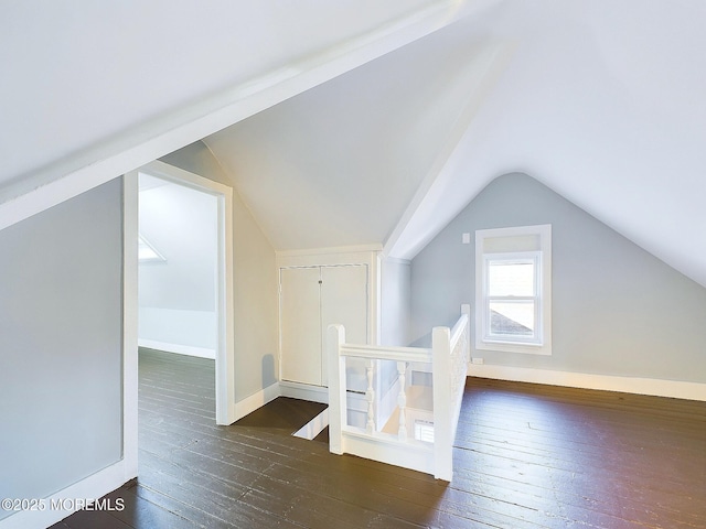 78 Lake Ave, Ocean Grove, NJ 07756 - additional living space featuring baseboards, vaulted ceiling, and dark wood-style flooring