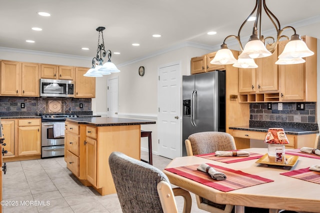 kitchen with light tile patterned flooring, a center island, stainless steel appliances, crown molding, and hanging light fixtures