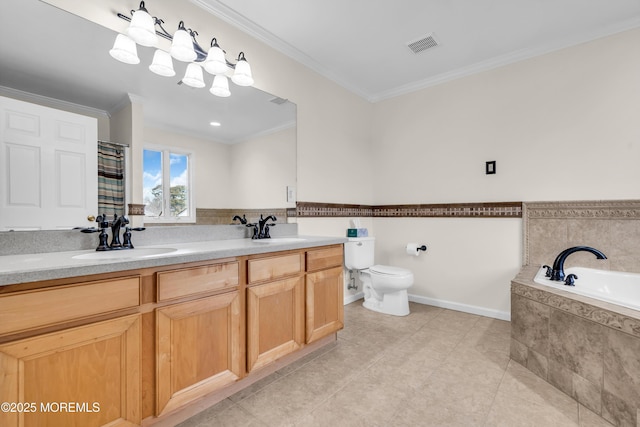 bathroom with vanity, tile patterned flooring, crown molding, and a relaxing tiled tub