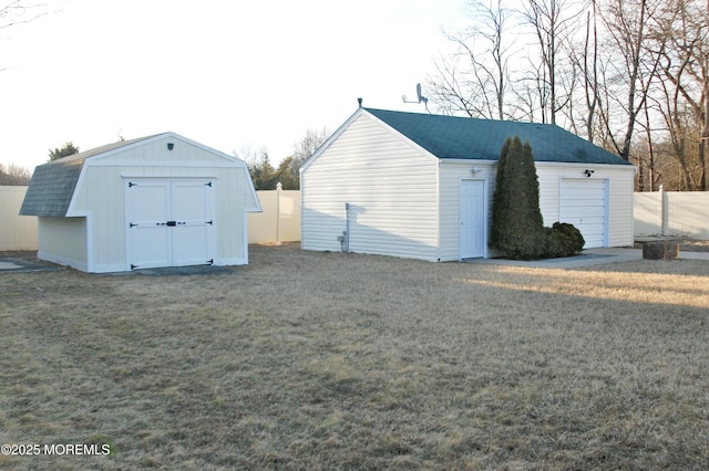 view of shed with fence