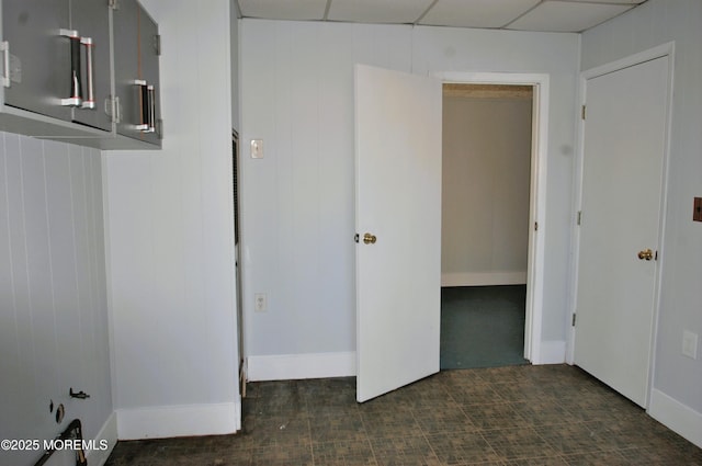 interior space featuring a paneled ceiling