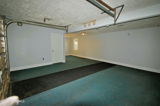 garage with baseboards