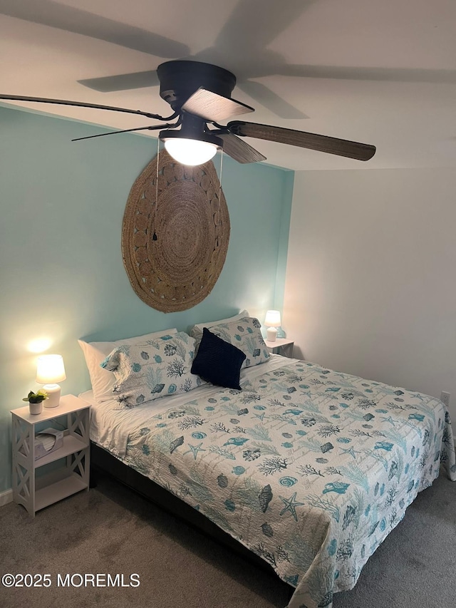 carpeted bedroom with ceiling fan