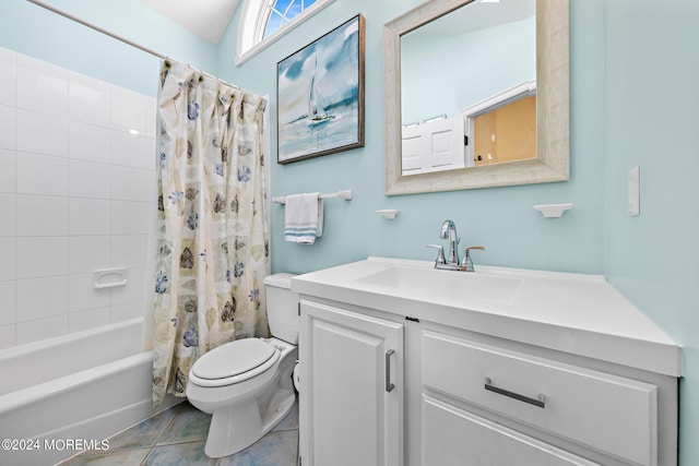 full bathroom with tile patterned flooring, vanity, toilet, and shower / bath combo with shower curtain