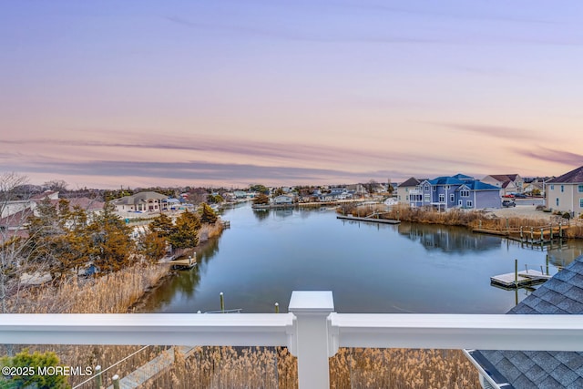 property view of water featuring a boat dock