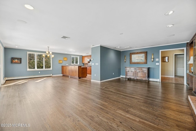 unfurnished living room with dark wood-style floors, ornamental molding, baseboard heating, and visible vents