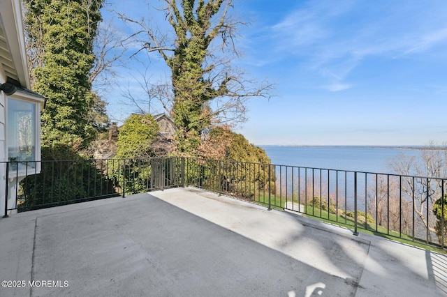 view of patio / terrace featuring a water view