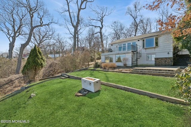 view of yard featuring stairway