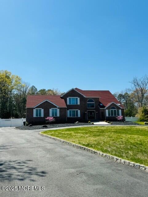 view of front of house with a front yard